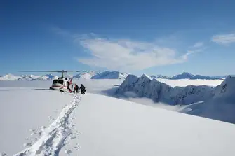 Enjoy the fresh snow as you ski down the slopes of the Antarctic 